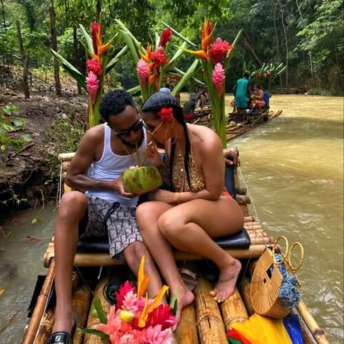 Guests on a decorated bamboo raft at Lethe